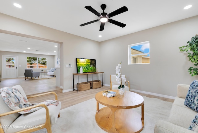 1340 Lester Ct, Merritt Island, FL 32952 - living room featuring light wood-style floors, recessed lighting, baseboards, and ceiling fan