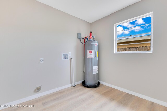 1340 Lester Ct, Merritt Island, FL 32952 - utility room with electric water heater
