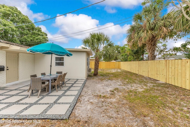 1340 Lester Ct, Merritt Island, FL 32952 - fenced backyard featuring a patio