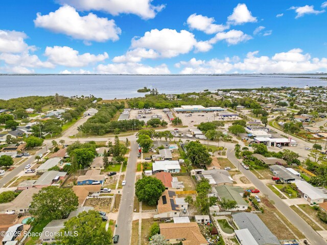 1340 Lester Ct, Merritt Island, FL 32952 - aerial view of property's location featuring a large body of water and nearby suburban area