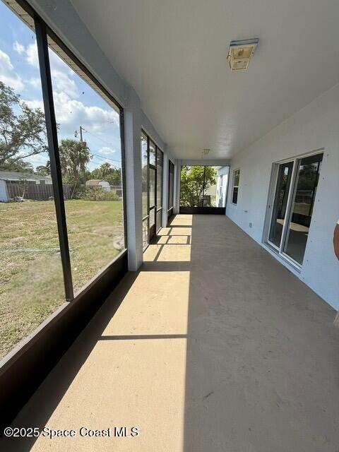 982 Colonial Ave SE, Palm Bay, FL 32909 - view of unfurnished sunroom