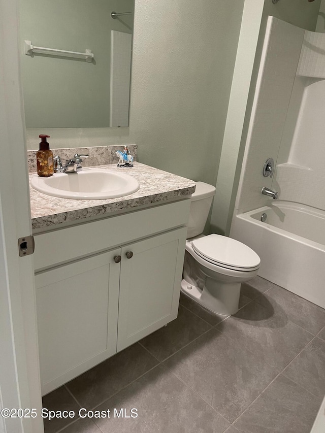 7055 Topaz Dr, Grant-Valkaria, FL 32949 - bathroom featuring vanity, tile patterned flooring, and  shower combination