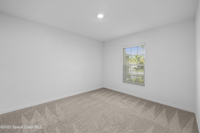 1422 Van Dyke Ave SE, Palm Bay, FL 32909 - empty room with carpet flooring and baseboards
