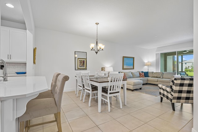 2611 Ballydoyle Ln, Melbourne, FL 32940 - dining area with light tile patterned floors, a chandelier, and recessed lighting
