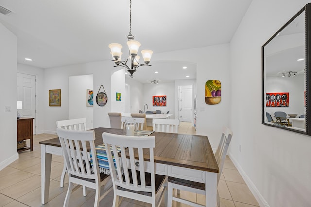 2611 Ballydoyle Ln, Melbourne, FL 32940 - dining space with light tile patterned floors, a chandelier, recessed lighting, and baseboards