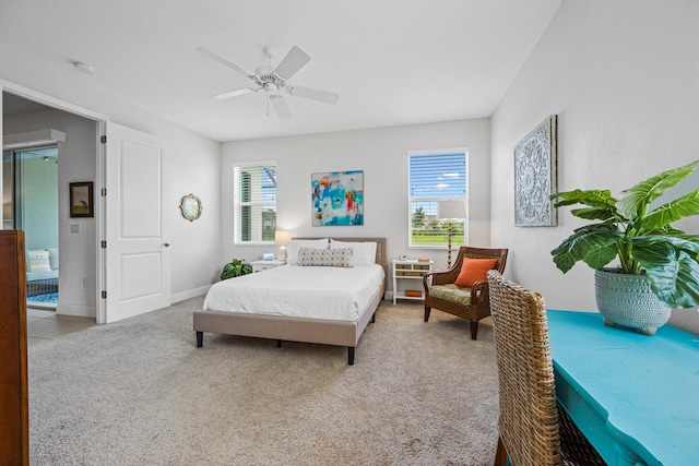 2611 Ballydoyle Ln, Melbourne, FL 32940 - carpeted bedroom with multiple windows, ceiling fan, and baseboards