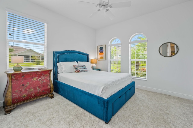 2611 Ballydoyle Ln, Melbourne, FL 32940 - carpeted bedroom with baseboards and ceiling fan