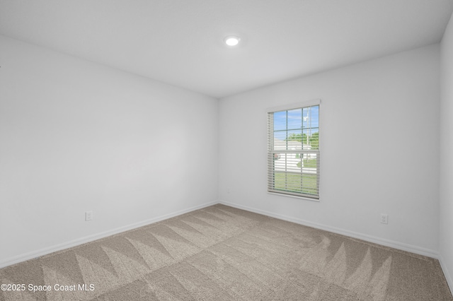 1170 Pluto St SE, Palm Bay, FL 32909 - carpeted empty room featuring baseboards and recessed lighting