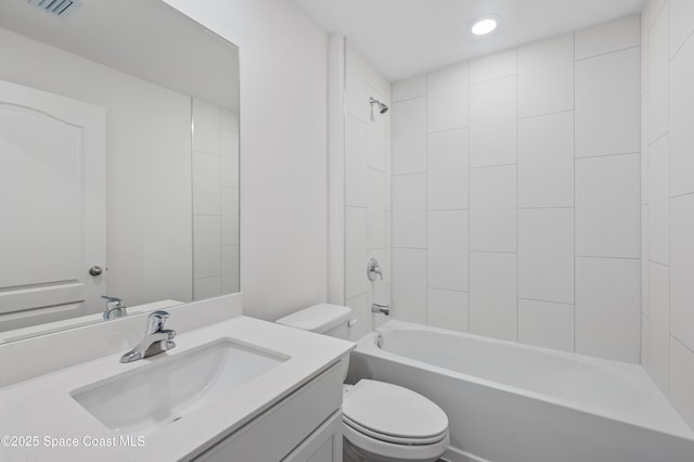 1170 Pluto St SE, Palm Bay, FL 32909 - bathroom with toilet, vanity, shower / washtub combination, and recessed lighting