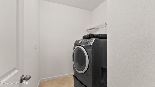 422 Moray Dr SW, Palm Bay, FL 32908 - washroom featuring washer / clothes dryer and baseboards