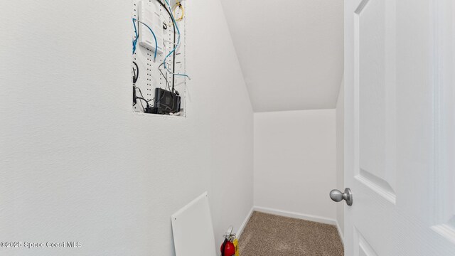 422 Moray Dr SW, Palm Bay, FL 32908 - detailed view of carpet, baseboards, and a fire extinguisher