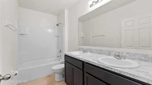 422 Moray Dr SW, Palm Bay, FL 32908 - full bathroom with toilet, double vanity, shower / washtub combination, and tile patterned floors