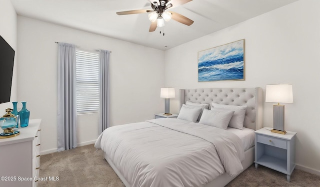 422 Moray Dr SW, Palm Bay, FL 32908 - bedroom with light carpet, baseboards, and a ceiling fan