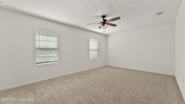 422 Moray Dr SW, Palm Bay, FL 32908 - carpeted empty room featuring ceiling fan and baseboards