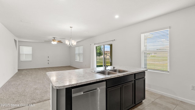 422 Moray Dr SW, Palm Bay, FL 32908 - kitchen with stainless steel dishwasher, a sink, a ceiling fan, light countertops, and pendant lighting