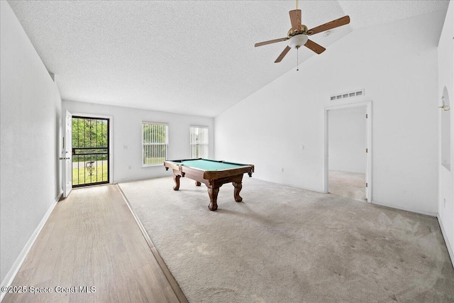 3380 Toledo Ave, Palm Bay, FL 32908 - playroom with pool table, a textured ceiling, a ceiling fan, wood finished floors, and high vaulted ceiling