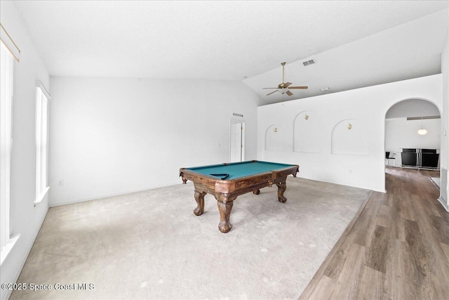 3380 Toledo Ave, Palm Bay, FL 32908 - playroom with arched walkways, a ceiling fan, lofted ceiling, billiards, and wood finished floors