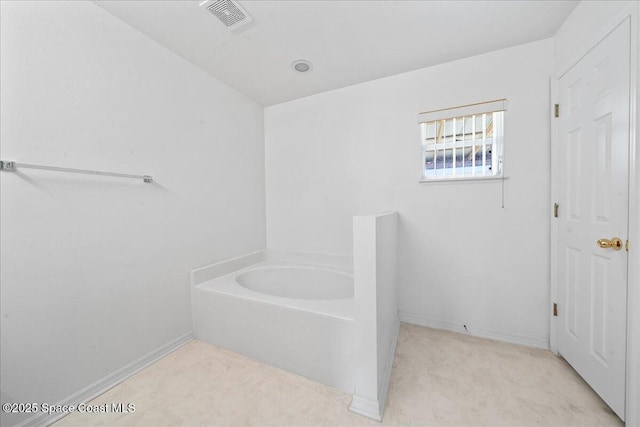 3380 Toledo Ave, Palm Bay, FL 32908 - bathroom with a bath and baseboards