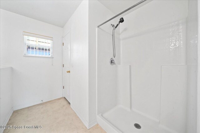 3380 Toledo Ave, Palm Bay, FL 32908 - full bath featuring a shower and baseboards