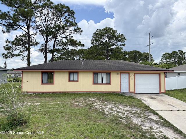 322 Ixora Ave NW, Palm Bay, FL 32907 - ranch-style house with concrete driveway and an attached garage