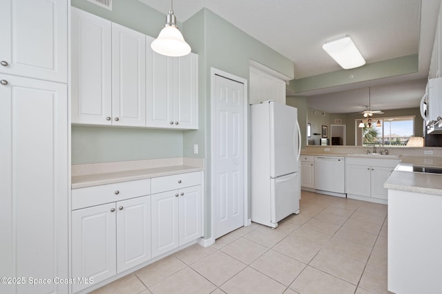 6848 Toland Dr Unit 208, Melbourne, FL 32940 - kitchen with white appliances, a sink, and white cabinets