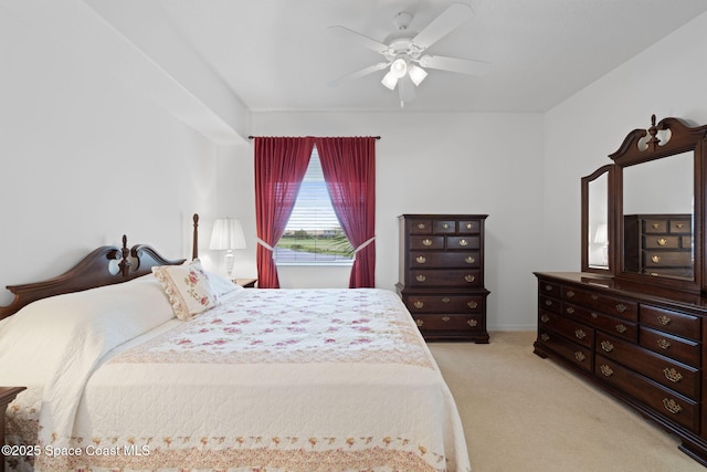 6848 Toland Dr Unit 208, Melbourne, FL 32940 - bedroom with carpet floors and ceiling fan
