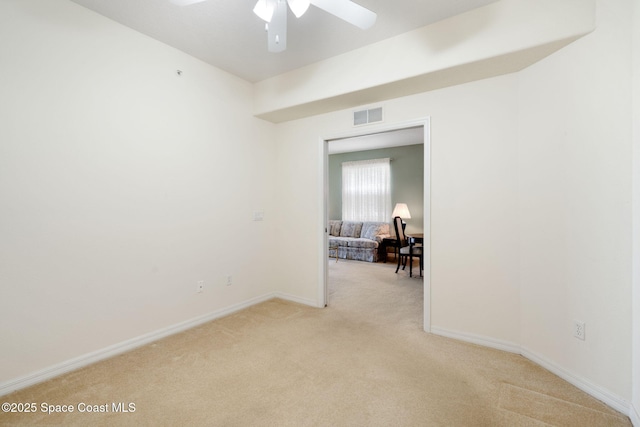 6848 Toland Dr Unit 208, Melbourne, FL 32940 - unfurnished room with light carpet, ceiling fan, and baseboards