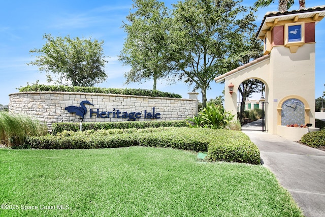 6848 Toland Dr Unit 208, Melbourne, FL 32940 - community sign featuring a yard