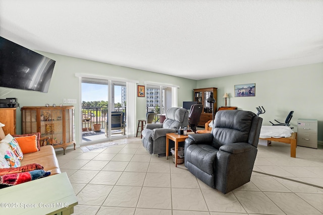 1700 N Atlantic Ave Unit 133, Cocoa Beach, FL 32931 - living room featuring light tile patterned flooring