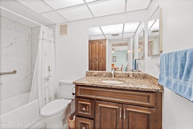 1700 N Atlantic Ave Unit 133, Cocoa Beach, FL 32931 - full bath featuring vanity, toilet, shower / tub combo, and ceiling fan