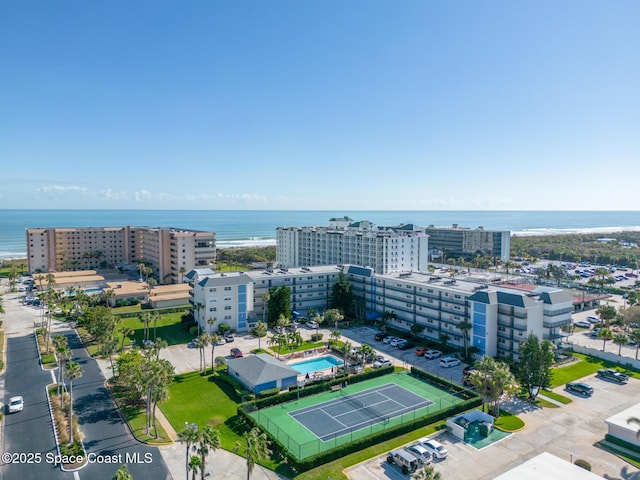 1700 N Atlantic Ave Unit 133, Cocoa Beach, FL 32931 - view of urban area featuring a large body of water, a pool, and apartment complex