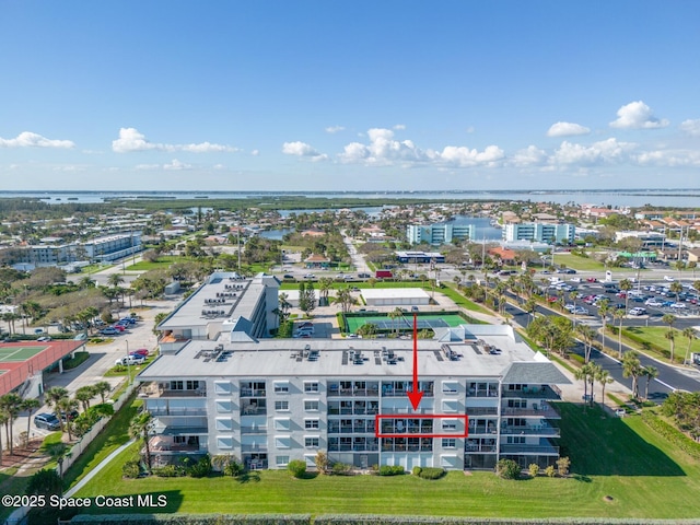 1700 N Atlantic Ave Unit 133, Cocoa Beach, FL 32931 - drone / aerial view of a nearby body of water and apartment complex / building