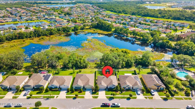 3779 Bishop Landing Way, Orlando, FL 32824 - aerial view of residential area with a nearby body of water