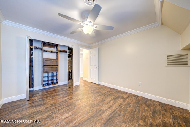 350 Taylor Ave Unit 2B3, Cape Canaveral, FL 32920 - unfurnished bedroom with crown molding, baseboards, wood finished floors, and a closet