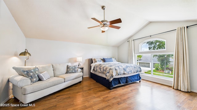 3266 Helmsdale Ct, Melbourne, FL 32940 - bedroom with lofted ceiling, wood finished floors, a ceiling fan, and baseboards