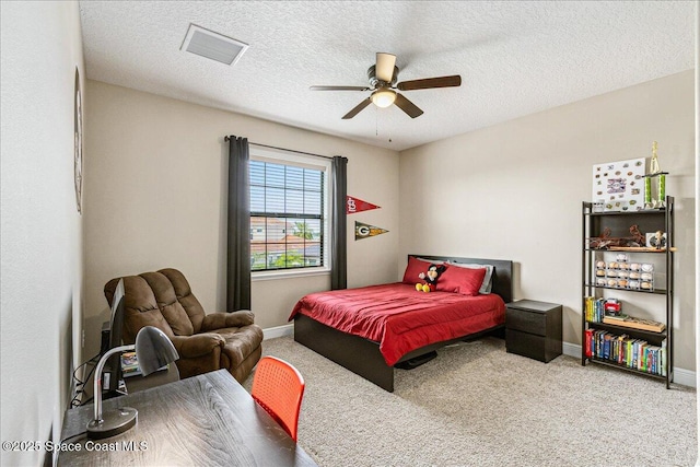 2228 Zuma Ln, Melbourne, FL 32940 - carpeted bedroom featuring a textured ceiling and ceiling fan