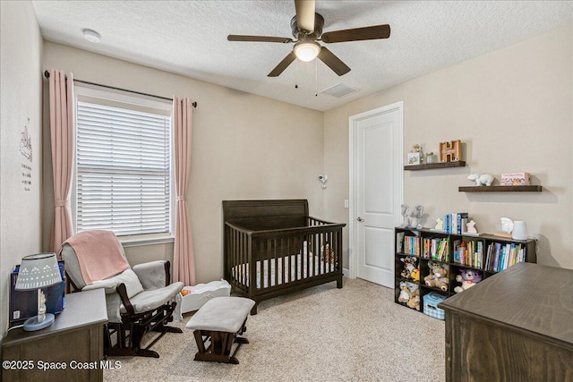 2228 Zuma Ln, Melbourne, FL 32940 - carpeted bedroom featuring a textured ceiling and a ceiling fan