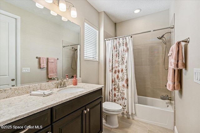 2228 Zuma Ln, Melbourne, FL 32940 - bathroom featuring vanity, shower / tub combo, tile patterned floors, and a textured ceiling