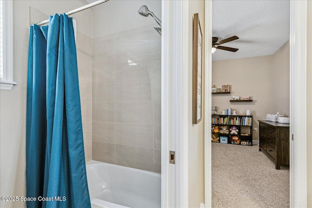 2228 Zuma Ln, Melbourne, FL 32940 - full bathroom featuring shower / tub combo with curtain, a ceiling fan, a textured ceiling, and vanity
