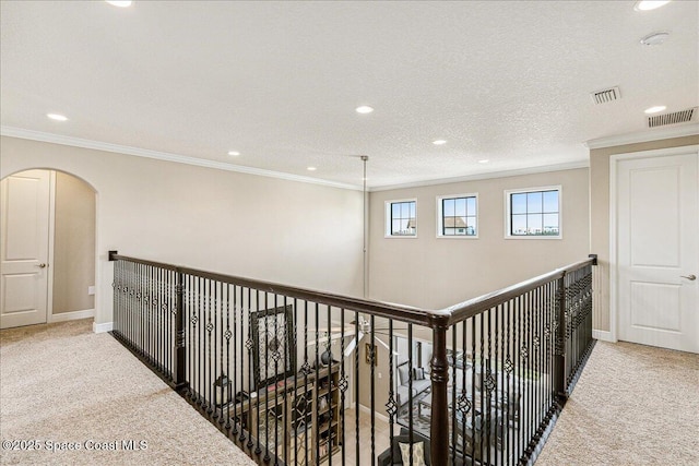 2228 Zuma Ln, Melbourne, FL 32940 - corridor featuring carpet, ornamental molding, recessed lighting, and arched walkways