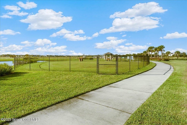 2228 Zuma Ln, Melbourne, FL 32940 - view of yard with a dog friendly area and a water view