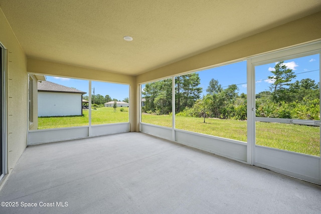 1650 Wyoming Dr SE, Palm Bay, FL 32909 - unfurnished sunroom featuring plenty of natural light