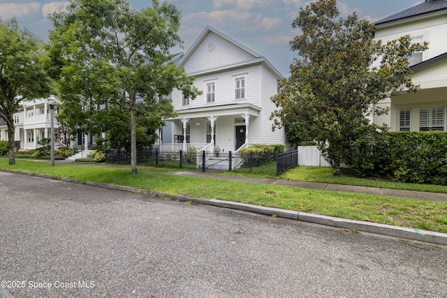 3074 Stanfield Ave, Orlando, FL 32814 - view of front of home with a porch and a gate