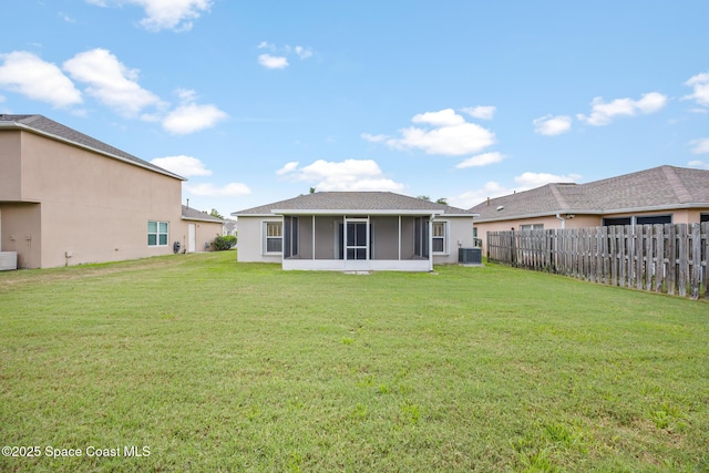 2268 Spring Creek Cir, Palm Bay, FL 32905 - rear view of house featuring central AC unit and a sunroom
