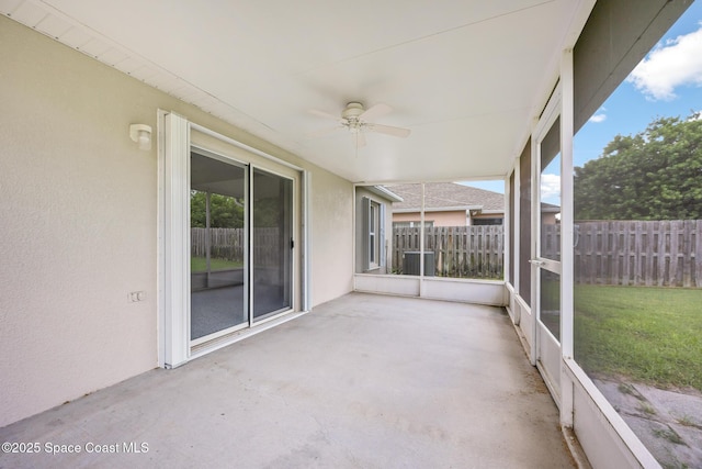 2268 Spring Creek Cir, Palm Bay, FL 32905 - unfurnished sunroom with a ceiling fan and plenty of natural light