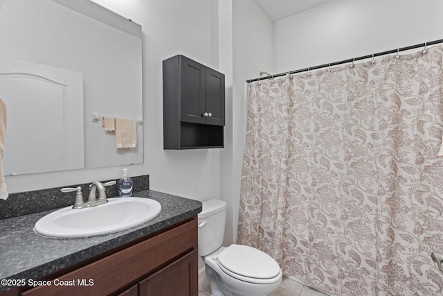 4015 Harvest Cir, Rockledge, FL 32955 - full bathroom featuring vanity, toilet, a shower with curtain, and tile patterned floors