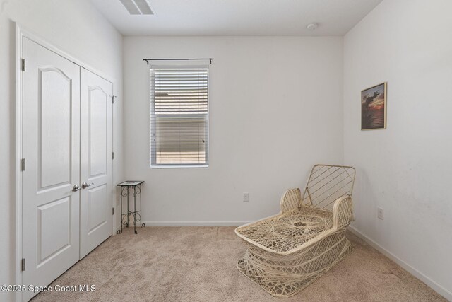 4015 Harvest Cir, Rockledge, FL 32955 - living area with carpet and baseboards