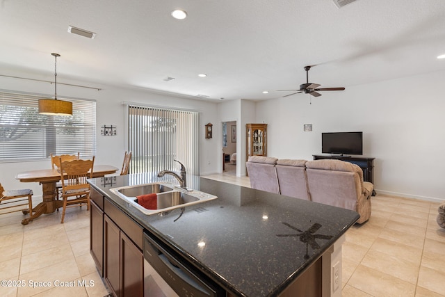 4015 Harvest Cir, Rockledge, FL 32955 - kitchen featuring dishwasher, a sink, ceiling fan, an island with sink, and hanging light fixtures