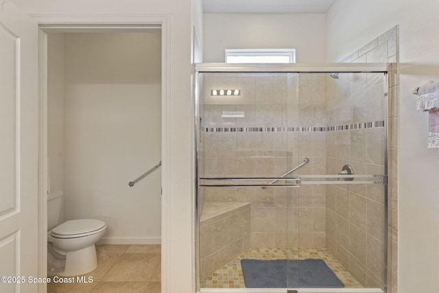 4015 Harvest Cir, Rockledge, FL 32955 - bathroom featuring toilet, a stall shower, and tile patterned floors