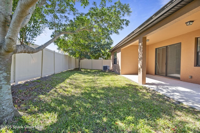 4015 Harvest Cir, Rockledge, FL 32955 - view of yard featuring central air condition unit and a patio